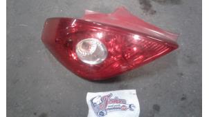 Used Taillight, left Opel Corsa D 1.2 16V Price on request offered by Autodemontage Joko B.V.