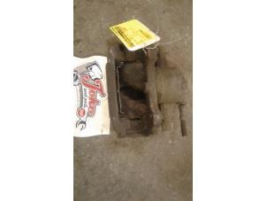 Used Front brake calliper, right Opel Corsa D 1.2 16V Price on request offered by Autodemontage Joko B.V.