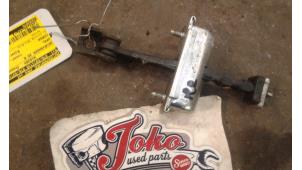 Used Door stop 2-door, right Opel Corsa D 1.2 16V Price on request offered by Autodemontage Joko B.V.