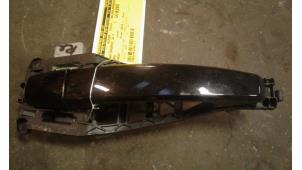 Used Door handle 2-door, right Opel Corsa D 1.2 16V Price on request offered by Autodemontage Joko B.V.
