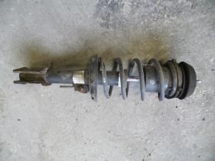 Used Front shock absorber rod, left Opel Tigra Twin Top 1.3 CDTi 16V Price on request offered by Autodemontage Joko B.V.