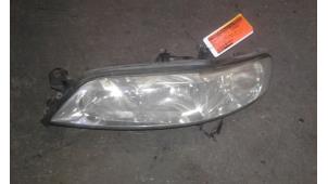 Used Headlight, left Opel Vectra B (38) 1.8 16V Ecotec Price on request offered by Autodemontage Joko B.V.