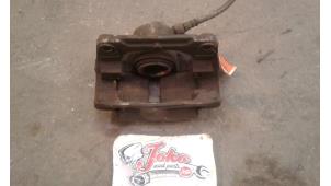 Used Front brake calliper, right Renault Scénic II (JM) 2.0 16V Price on request offered by Autodemontage Joko B.V.