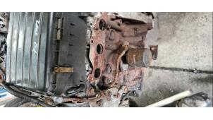 Engine from a Daihatsu Cuore (L251/271/276) 1.0 12V DVVT 2003
