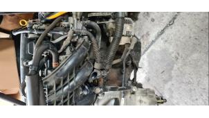 Engine from a Daihatsu Cuore (L251/271/276) 1.0 12V DVVT 2003