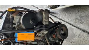 Engine from a Daihatsu Cuore (L251/271/276) 1.0 12V DVVT 2003