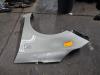 Front wing, left from a Kia Carens IV (RP) 1.6 GDI 16V 2014