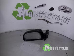Used Wing mirror, left Mitsubishi Colt (CJ) 1.3 GL,GLX 12V Price € 15,00 Margin scheme offered by Autodemontagebedrijf De Mars