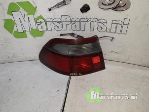 Used Taillight, left Mazda 626 (GF12) 2.0i 16V GLX Price € 22,50 Margin scheme offered by Autodemontagebedrijf De Mars