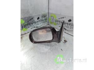 Gebrauchte Außenspiegel links Ssang Yong Kyron 2.0 200 Xdi 16V 4x2 Preis € 24,00 Margenregelung angeboten von Autodemontagebedrijf De Mars