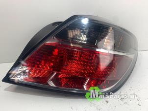 Used Taillight, right Opel Astra H GTC (L08) 1.8 16V Price € 25,00 Margin scheme offered by Autodemontagebedrijf De Mars