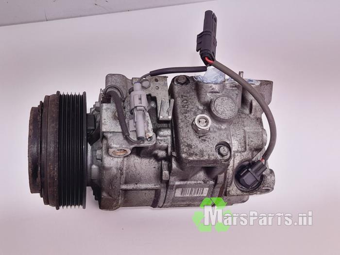 Air conditioning pump from a BMW 1 serie (E81) 120d 16V 2009