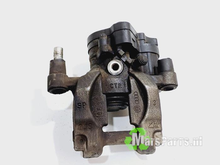 Rear brake calliper, left from a Volkswagen Passat Variant (3G5) 1.6 TDI 16V 2016
