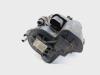 Rear brake calliper, left from a Volkswagen Passat Variant (3G5) 1.6 TDI 16V 2016