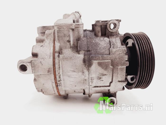 Air conditioning pump from a Volkswagen Golf Plus (5M1/1KP) 1.6 FSI 16V 2006