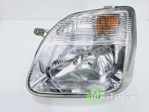 Used Headlight, left Suzuki Wagon-R+ (RB) 1.3 16V VVT Price € 40,00 Margin scheme offered by Autodemontagebedrijf De Mars