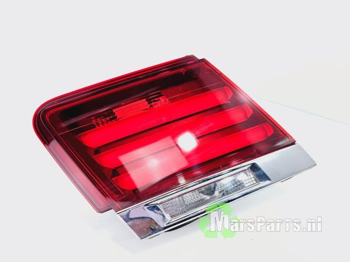 Taillight, left from a BMW 7 serie (F01/02/03/04) 740d xDrive 24V 2013
