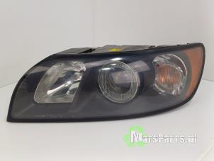 Used Headlight, left Volvo S40 (MS) 2.5 T5 20V AWD Price € 125,00 Margin scheme offered by Autodemontagebedrijf De Mars