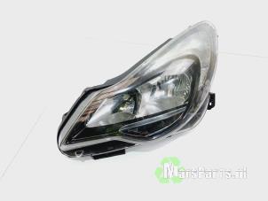 Used Headlight, left Opel Corsa E 1.3 CDTi 16V ecoFLEX Price € 180,00 Margin scheme offered by Autodemontagebedrijf De Mars