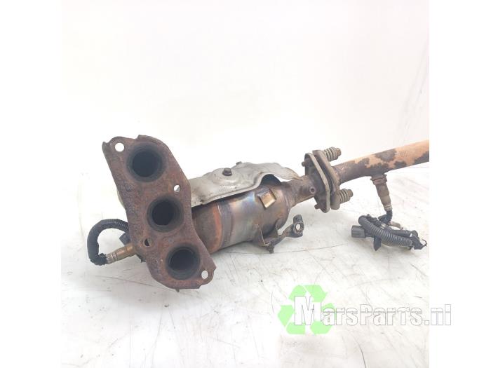 Exhaust manifold + catalyst from a Toyota Yaris II (P9) 1.0 12V VVT-i 2009