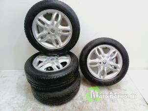 Used Set of wheels + tyres Renault Clio III (BR/CR) 1.2 16V 75 Price on request offered by Autodemontagebedrijf De Mars