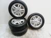 Set of wheels + tyres from a Renault Clio III (BR/CR), 2005 / 2014 1.2 16V 75, Hatchback, Petrol, 1.149cc, 55kW (75pk), FWD, D4F740; D4FD7; D4F706; D4F764; D4FE7, 2005-06 / 2014-12, BR/CR1J; BR/CRCJ; BR/CR1S; BR/CR9S; BR/CRCS; BR/CRFU; BR/CR3U; BR/CRP3 2007