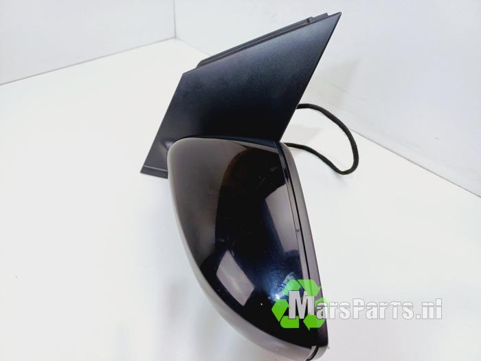Wing mirror, left from a Volkswagen Polo V (6R) 1.4 TDI DPF BlueMotion technology 2014