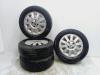 Set of wheels + tyres from a Renault Clio II (BB/CB), 1998 / 2016 1.4 16V, Hatchback, Petrol, 1.390cc, 72kW (98pk), FWD, K4J710; K4J711; K4J712; K4J713; K4J700, 2000-02 / 2008-07 2001