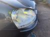Headlight, right from a Volkswagen Golf V (1K1) 1.9 TDI 2004