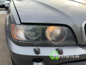 Używane Reflektor prawy BMW X5 (E53) 3.0 24V Cena € 200,00 Procedura marży oferowane przez Autodemontagebedrijf De Mars