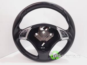 Used Steering wheel Fiat Grande Punto (199) 1.3 JTD Multijet 16V 85 Actual Price € 100,00 Margin scheme offered by Autodemontagebedrijf De Mars