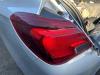 Feu arrière secondaire gauche d'un Opel Corsa E 1.3 CDTi 16V ecoFLEX 2017