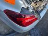 Feu arrière secondaire gauche d'un Opel Corsa E 1.3 CDTi 16V ecoFLEX 2017