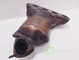 Used Exhaust manifold + catalyst Opel Corsa D 1.2 16V Price € 200,00 Margin scheme offered by Autodemontagebedrijf De Mars