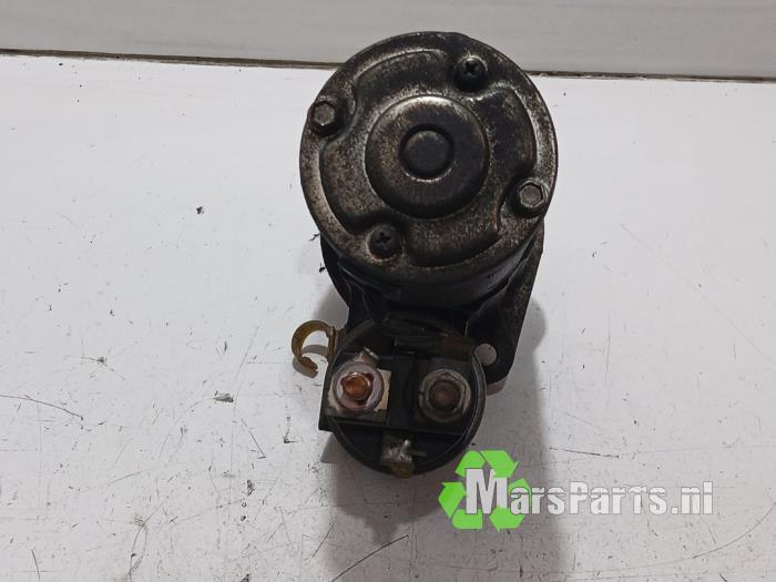 Gebrauchte Anlasser Mitsubishi Grandis (NA) 2.4 16V MIVEC Preis € 35,00 Margenregelung angeboten von Autodemontagebedrijf De Mars