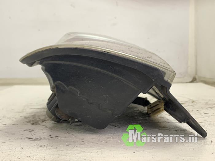 Baklykta, vänster från en Daihatsu Sirion 2 (M3) 1.0 12V DVVT 2007