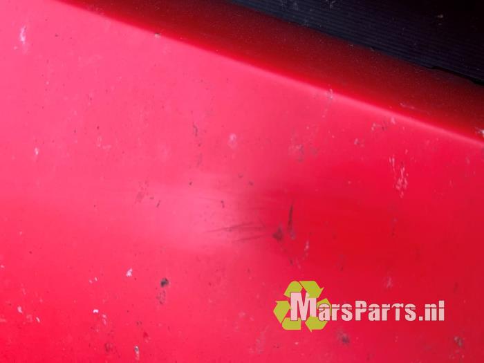Främre stötfångare från en Daihatsu Sirion 2 (M3) 1.0 12V DVVT 2007