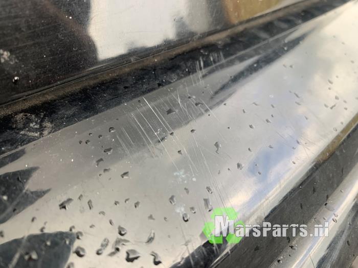 Rear bumper from a Volkswagen Polo IV (9N1/2/3) 1.4 16V 2005