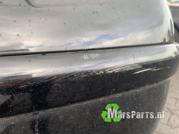 Rear bumper from a Volkswagen Polo IV (9N1/2/3) 1.4 16V 2005