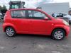 Tanklucka från en Daihatsu Sirion 2 (M3) 1.0 12V DVVT 2007