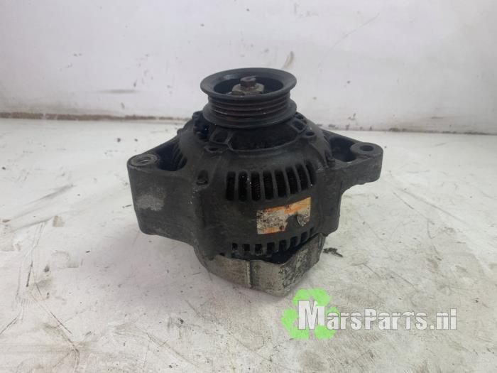 Begagnade Dynamo Toyota Starlet (EP8/NP8) 1.3 Friend,XLi 12V Pris € 60,00 Marginaltabell erbjuds av Autodemontagebedrijf De Mars