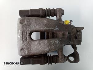Used Rear brake calliper, left Opel Zafira (M75) 1.7 CDTi 16V Price € 40,00 Margin scheme offered by Autobedrijf Broekhuis B.V.