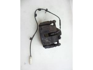 Used Front brake calliper, left Mini Clubman (R55) 1.6 Cooper D Price € 25,00 Margin scheme offered by Autobedrijf Broekhuis B.V.