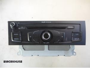 Używane Radioodtwarzacz CD Audi A5 Sportback Quattro (B8H/B8S) 2.0 TDI 16V Cena € 150,00 Procedura marży oferowane przez Autobedrijf Broekhuis B.V.