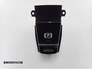 Usados Interruptor de freno de mano BMW 5 serie Touring (F11) 520d 16V Precio € 25,00 Norma de margen ofrecido por Autobedrijf Broekhuis B.V.