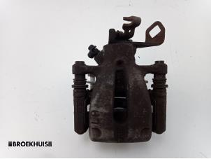 Used Rear brake calliper, left Mini Mini (R56) 1.4 16V One Price € 25,00 Margin scheme offered by Autobedrijf Broekhuis B.V.