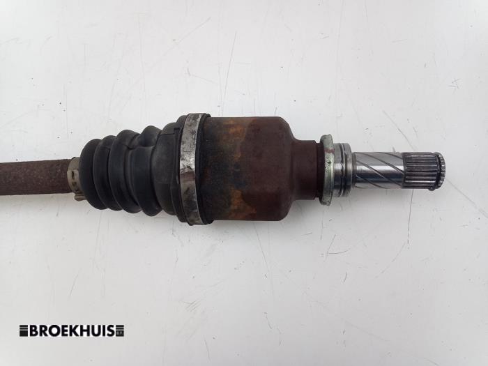 Front drive shaft, left from a Renault Clio III Estate/Grandtour (KR) 1.2 16V TCE 100 2008