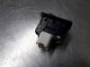 Seat heating switch from a Mazda 2 (DE) 1.3 16V MZR 2013