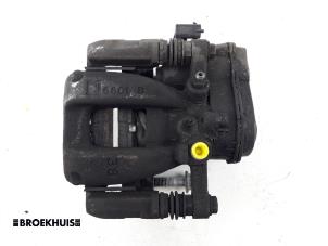 Used Rear brake calliper, right Opel Insignia Sports Tourer 1.5 Turbo 16V 165 Price € 90,00 Margin scheme offered by Autobedrijf Broekhuis B.V.