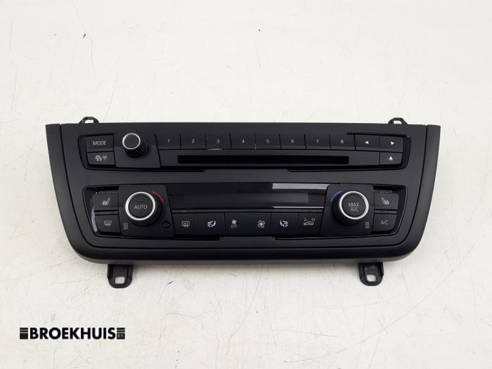 Heater control panel from a BMW 3 serie Touring (F31) 320d 2.0 16V 2013